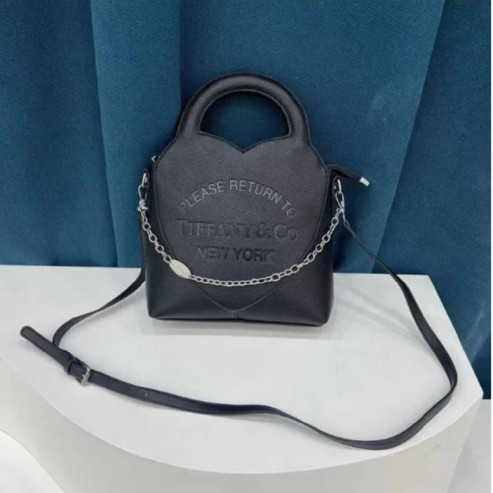Elegant Black Mini Bag with Tiffany Features.